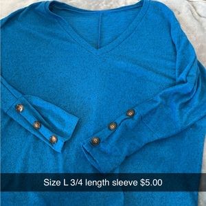 3/4 length sleeve shirt. It is a little oversized